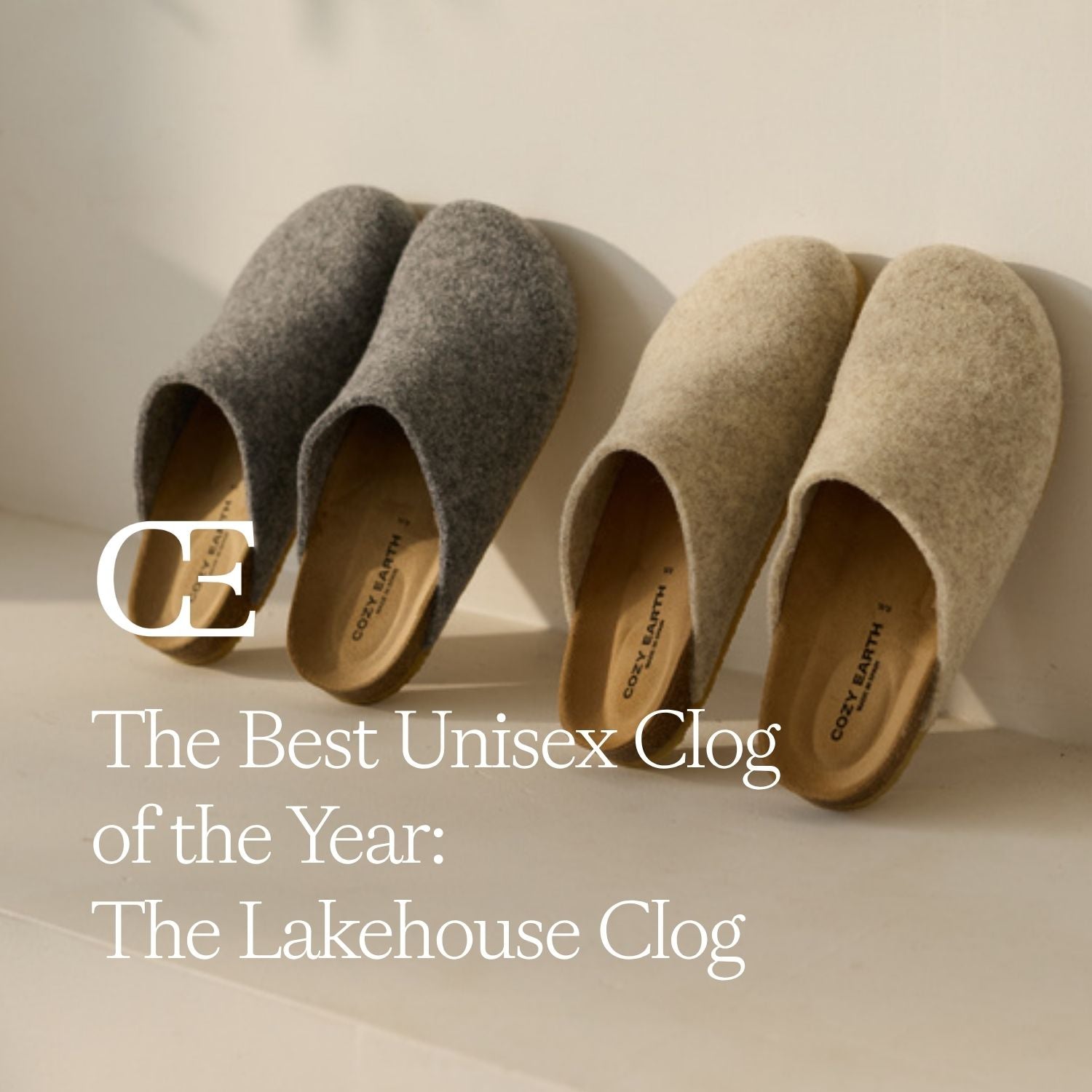 two pairs of lakehouse clogs leaning against a wall