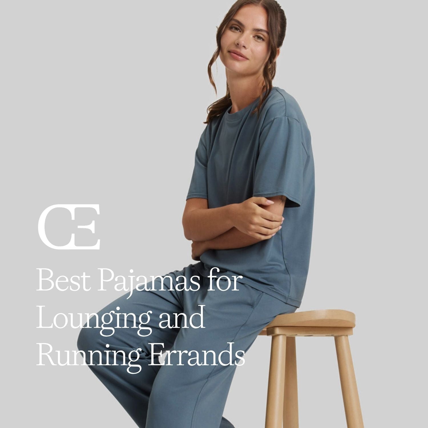 a woman wearing blue lounge set sits on a stool