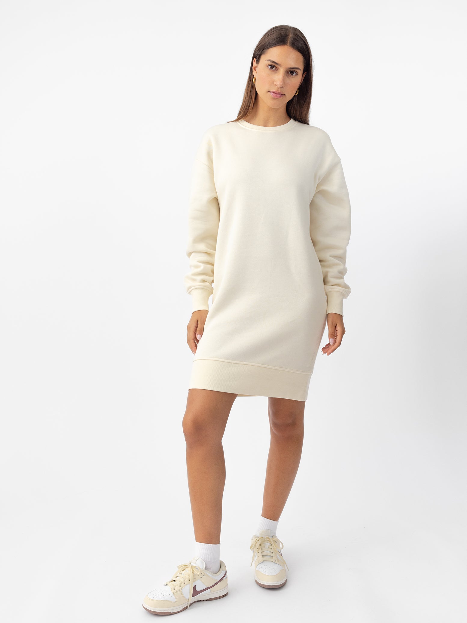 Woman wearing Alabaster CityScape Crewneck Dress with white background |Color:Alabaster