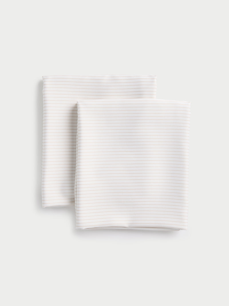 Flat lay of two standard/king pillowcases in Driftwood Pinstripe