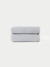 Nantucket Hand Towels in the color Heathered Harbor Mist. The Hand Towels are neatly folded. The photo of the Hand Towels was taken with a white background.|Color:Heathered Harbor Mist