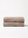 Sand luxe bath towels folded with white background |Color:Sand
