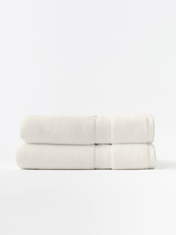 Seashell luxe bath towels folded with white background |Color:Seashell