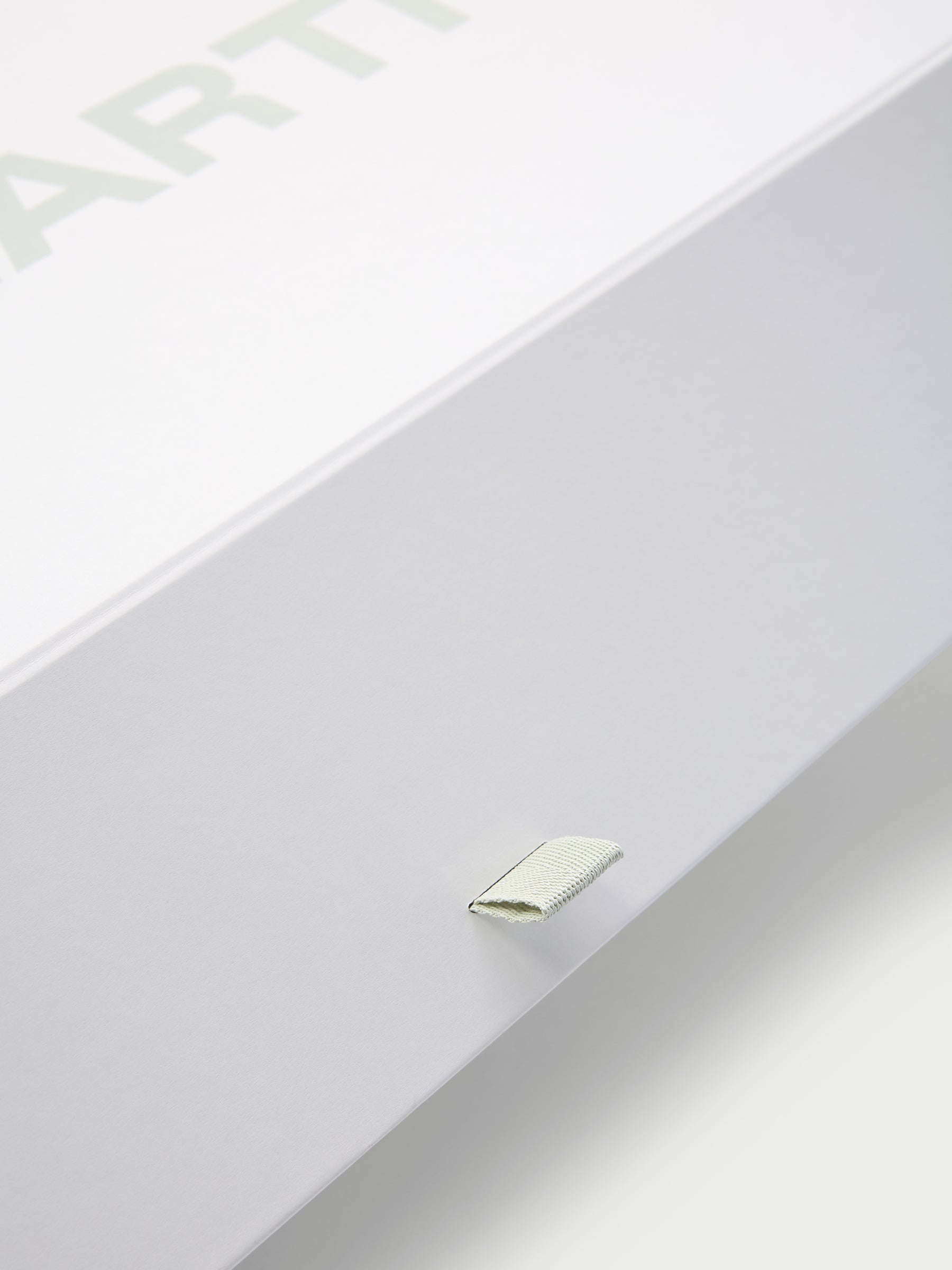 Close up of tab on gift box 