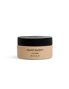 A beige jar with a black lid labeled "Cozy Earth Clay Mask" (59.1 ml, 2 fl oz) sits on a plain white background.
