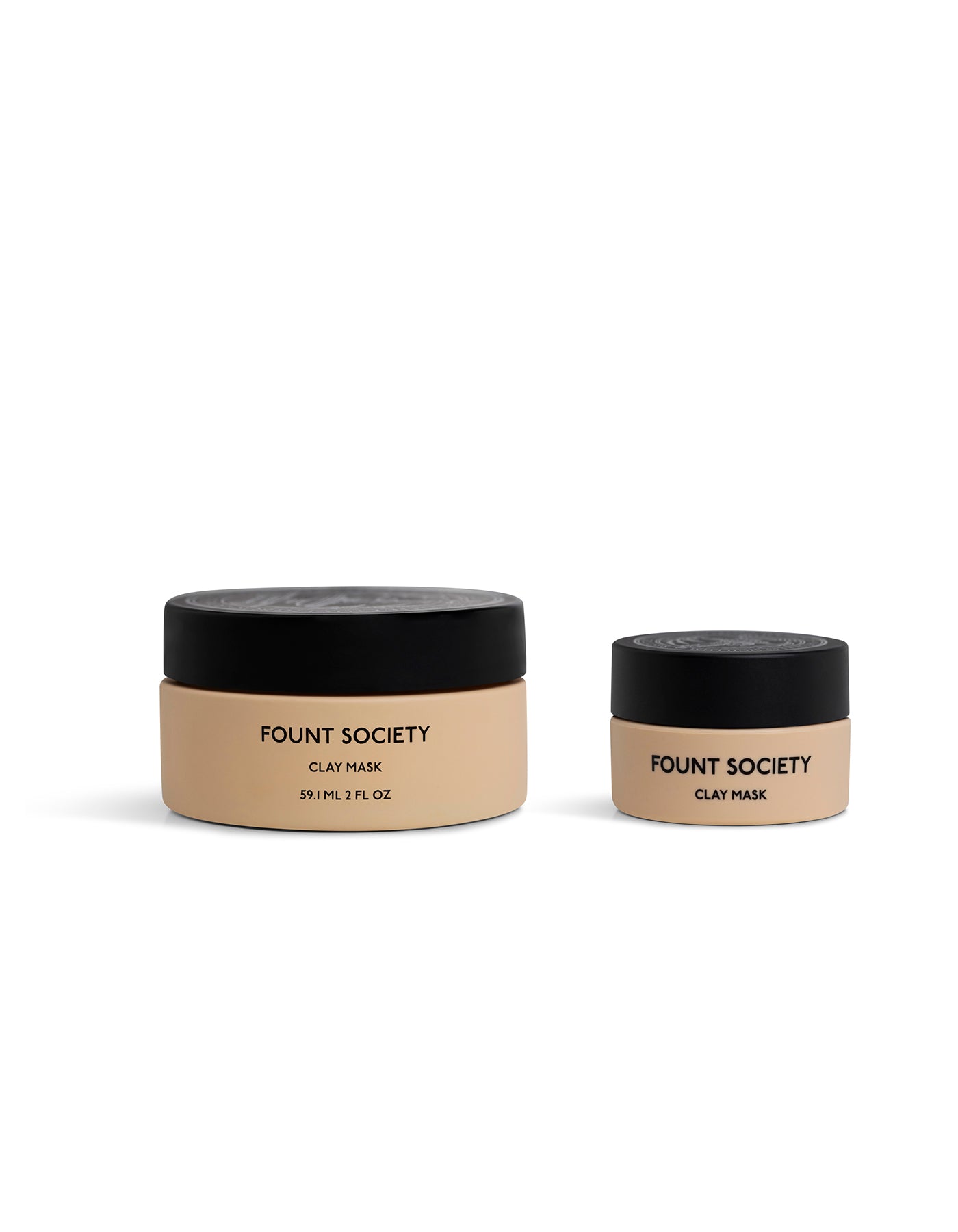 Two beige jars with black lids labeled "Cozy Earth Clay Mask" sit side by side on a white background; the left jar is larger (59 mL, 2 fl oz) and the right jar is smaller.