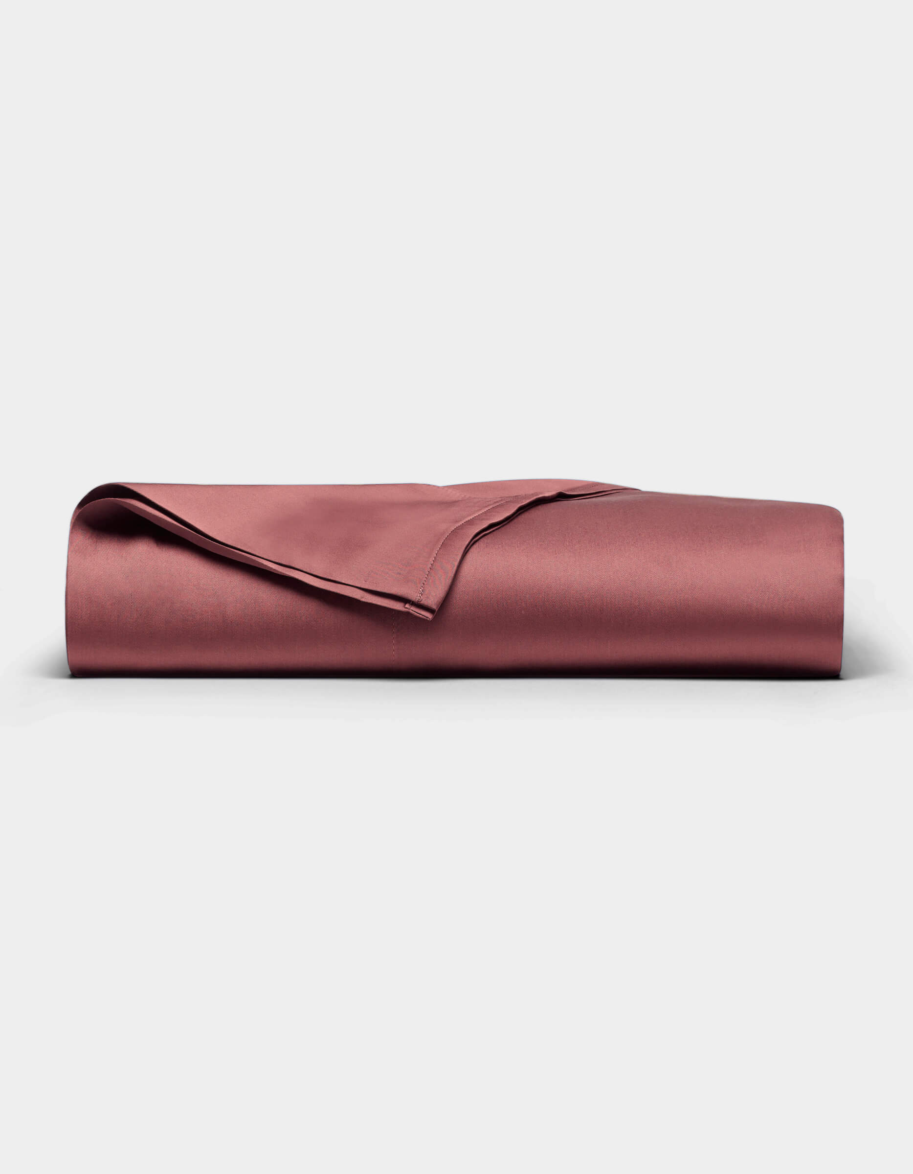A Cozy Earth Bamboo Flat Sheet in a rose color is neatly folded and displayed on a plain white background. |Color:Mulberry