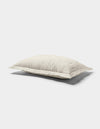 The Cozy Earth Bamboo Quilted Shams are shown against a plain white background, featuring a soft, white surface with subtle tufted details and gentle quilting.|Color:Oat