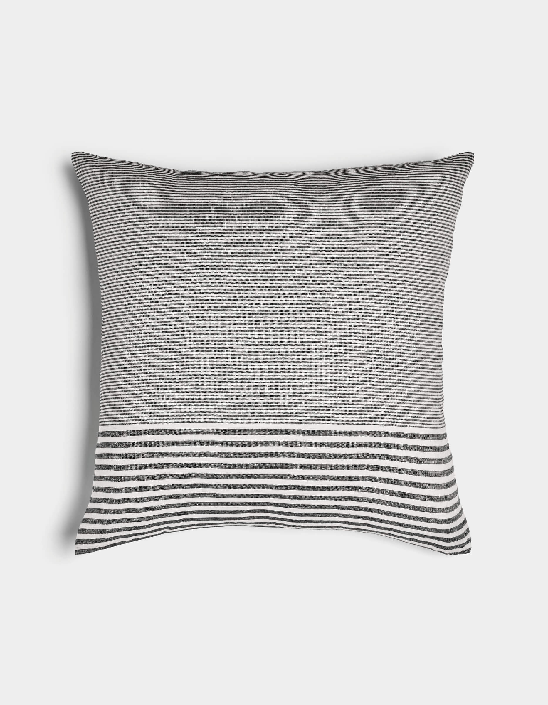The Cozy Earth Striped Throw Pillow features thin black and white horizontal stripes with a wider striped band near the bottom, displayed on a plain white background.