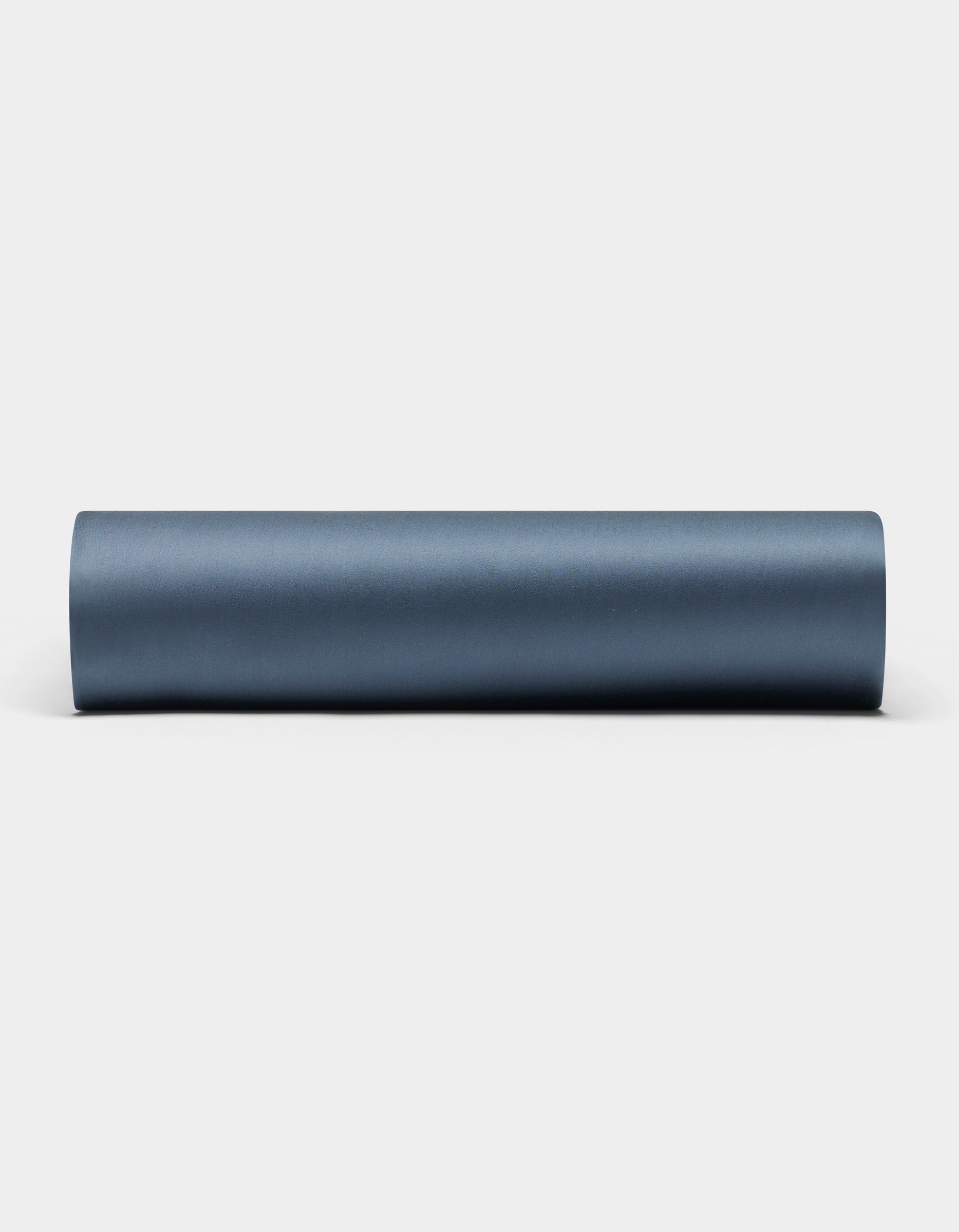 A Bamboo Fitted Sheet by Cozy Earth is laid out on a plain white background.|Color:Pacific Blue