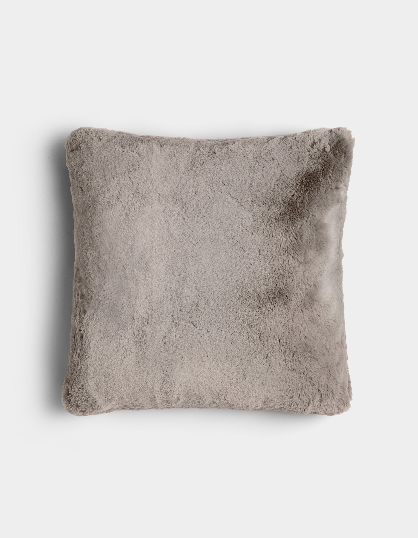 The Cuddle Pillow by Cozy Earth is a square, light gray plush pillow with a soft, fuzzy texture, displayed on a plain white background.|Color:Dove Grey |Size:24" x 24"
