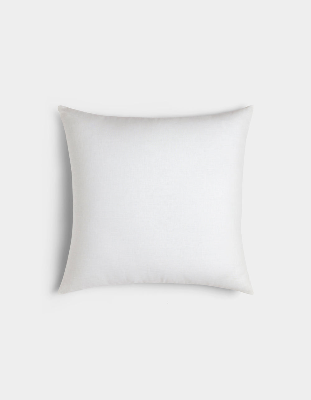The Cozy Earth Linen Throw Pillow is displayed from a top-down view, centered against a light gray background.|Color:White |Size:20" x 20"