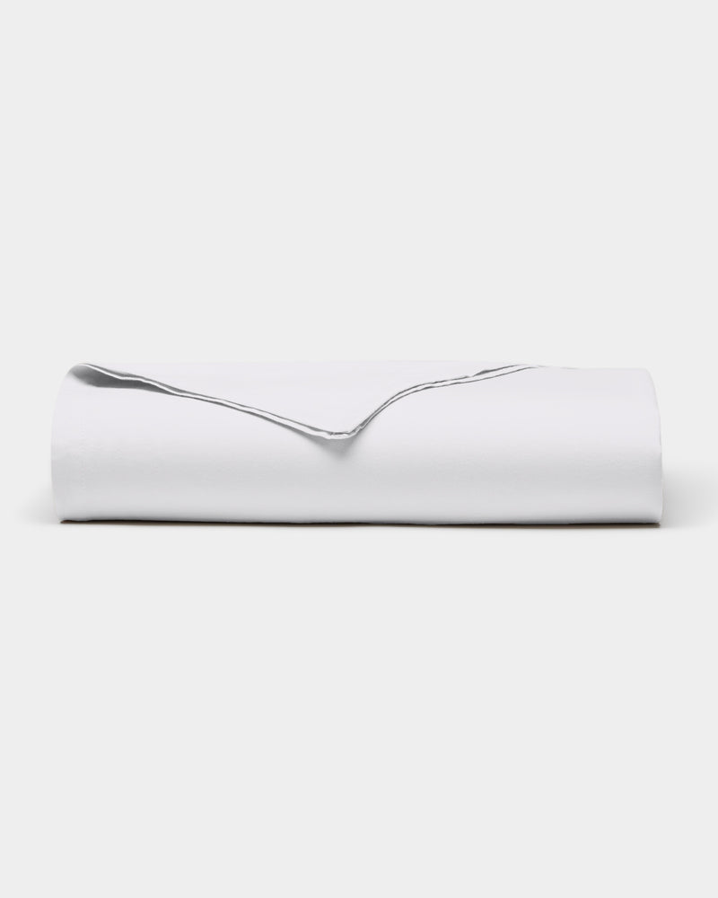 The Cozy Earth Soft-Wash Cotton Flat Sheet is neatly folded and displayed against a plain, light background.