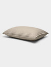 The Bamboo Jersey Quilted Shams by Cozy Earth are beige, rectangular pillows featuring a quilted pattern, displayed against a plain white background.|Color:Driftwood