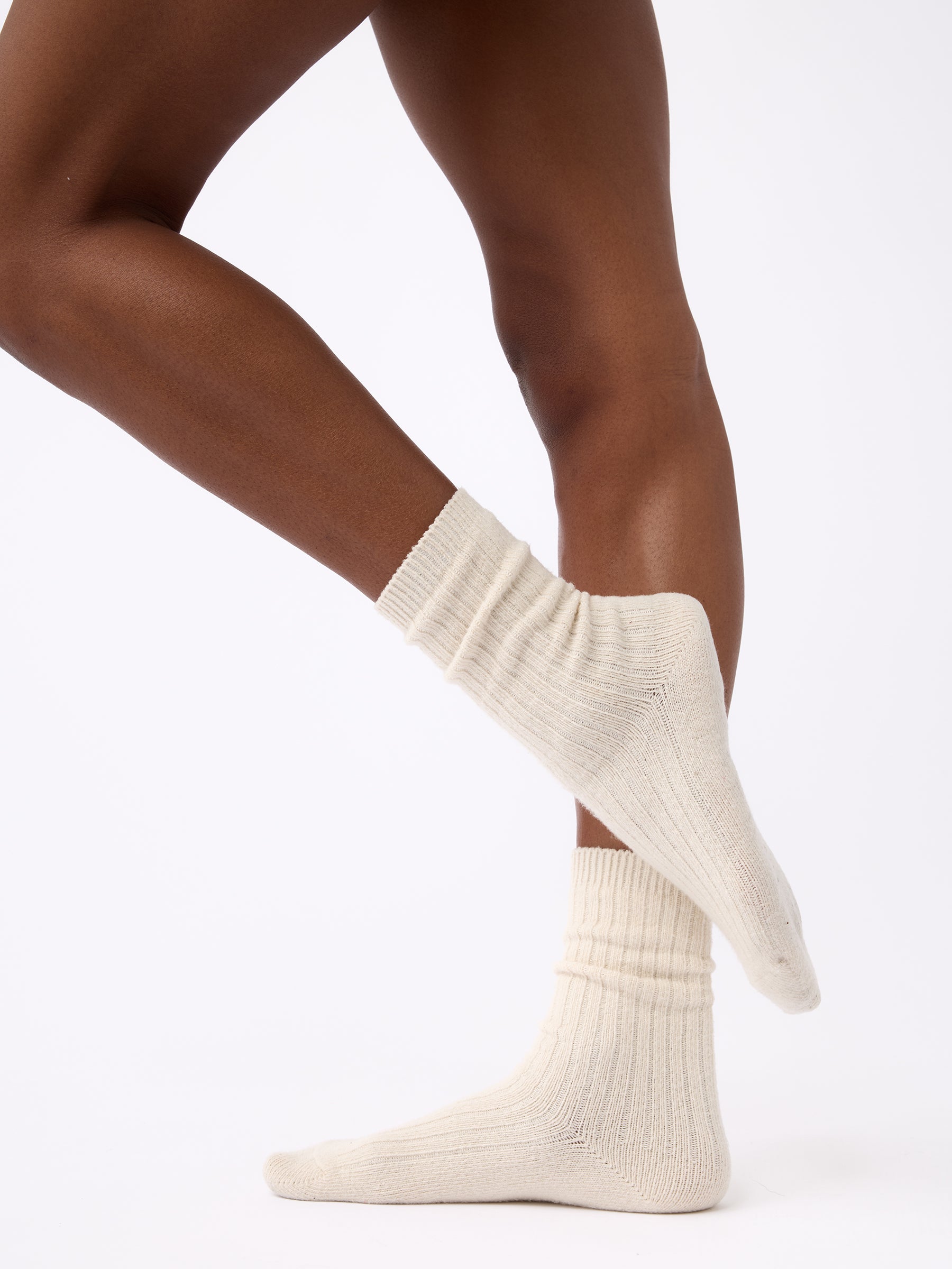 Person wearing Cozy Earth Plush Lounge Calf Sock 1-Pack in Alabaster |Color:Alabaster