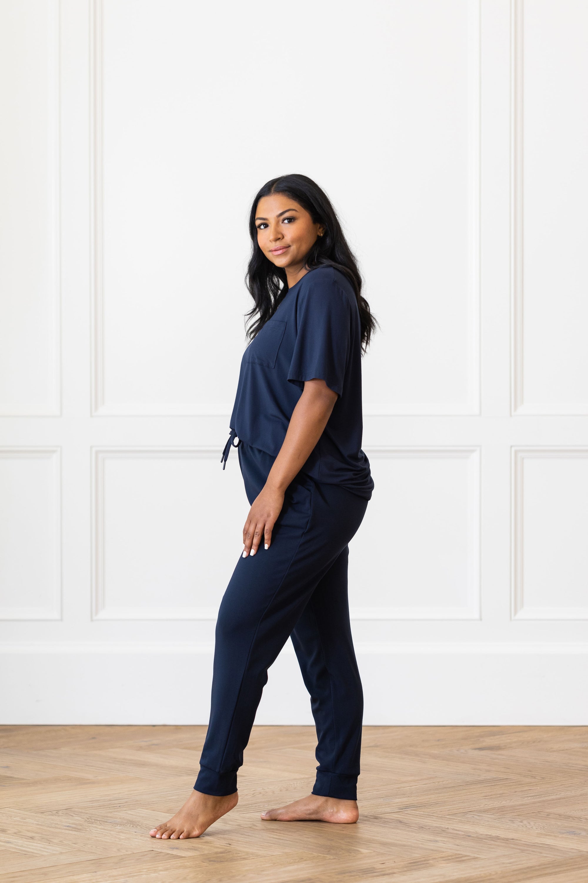 Woman wearing Cozy Earth Bamboo Lounge Tee in dark blue 