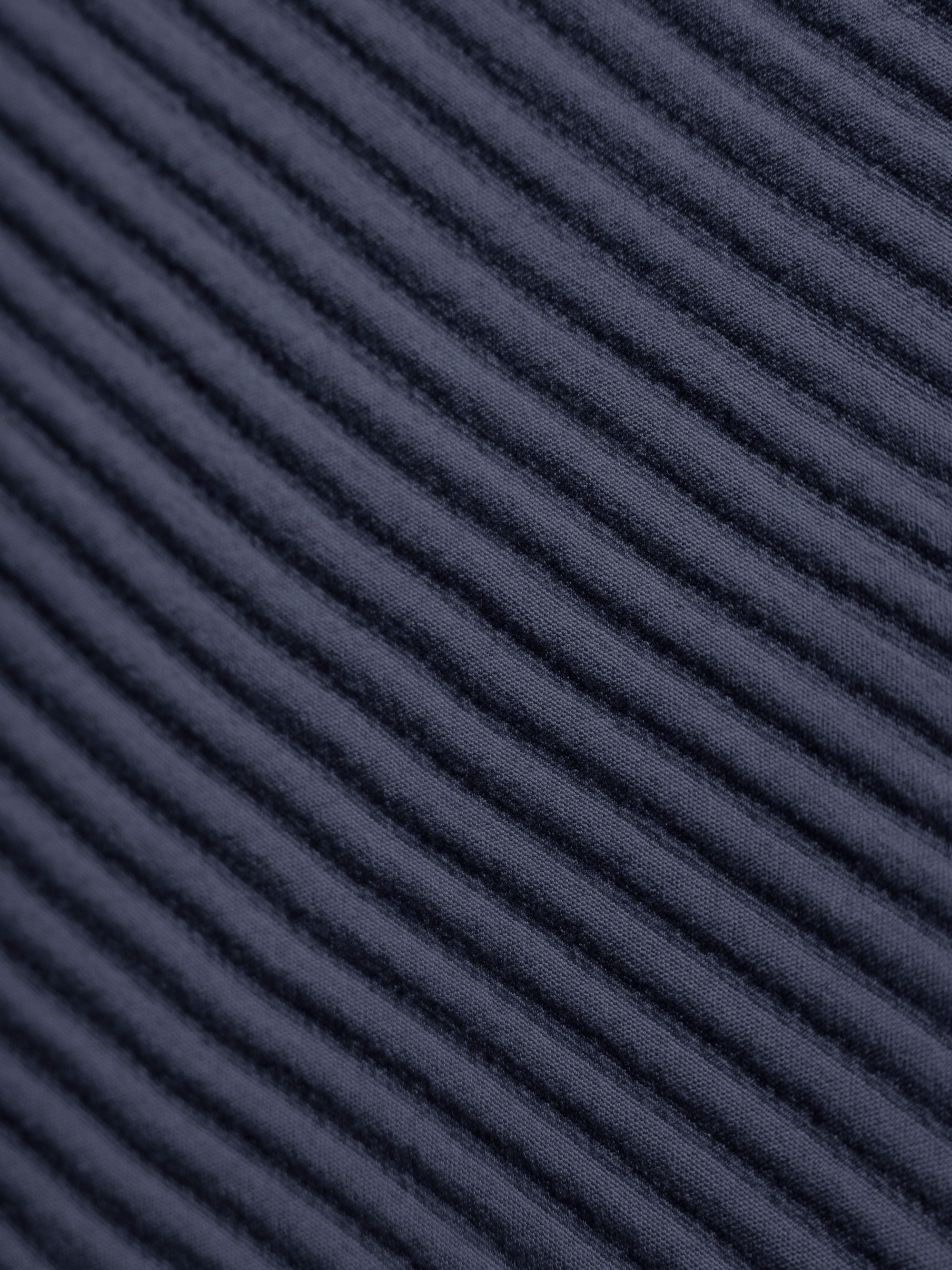 Close up of navy coverlet sham fabric 