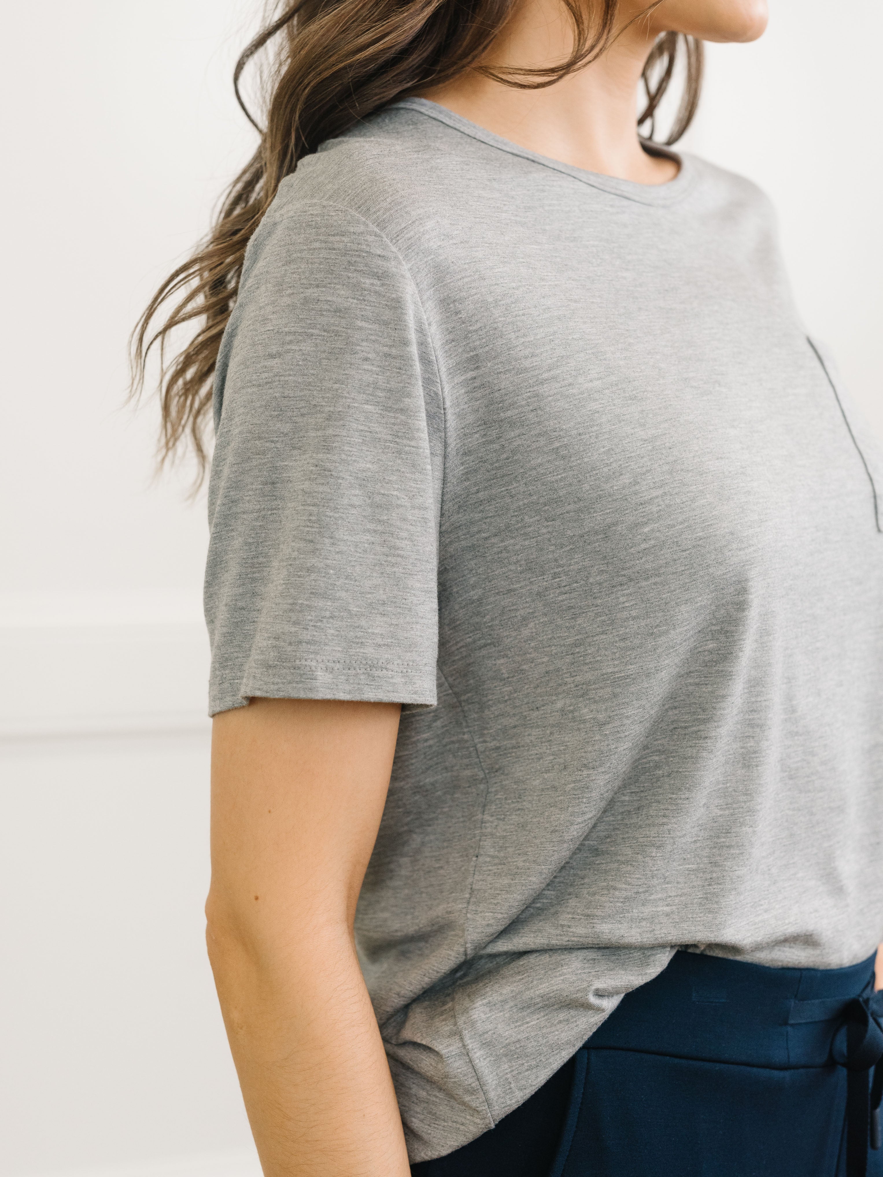 Close up detail of a woman wearing Cozy Earth Bamboo Lounge Tee in grey |Color:Grey