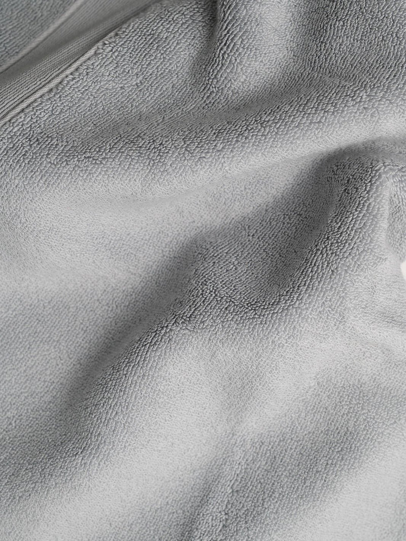 Close up of light grey luxe bath fabric
