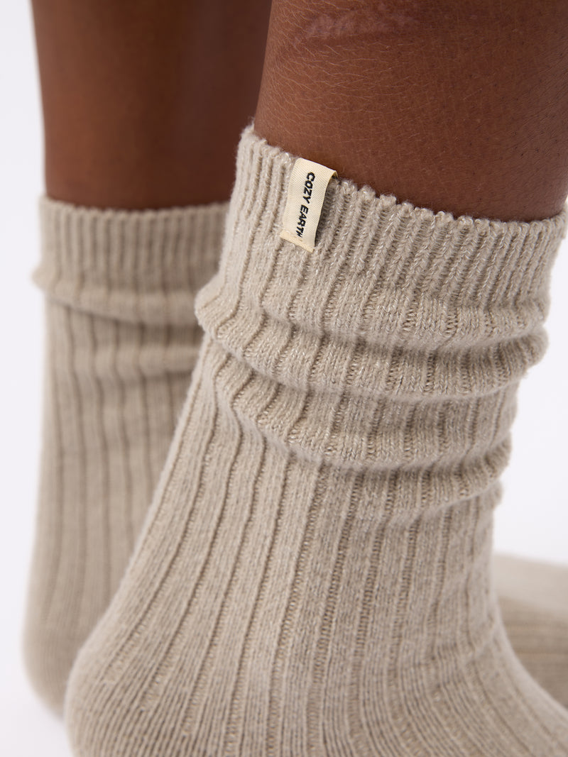 Close-up of tag on Cozy Earth Plush Lounge Calf Sock in Taupe