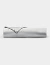 A neatly folded Cozy Earth Bamboo Flat Sheet in a gray and white striped pattern is displayed against a plain white background.|Color:Classic Stripe in Dew