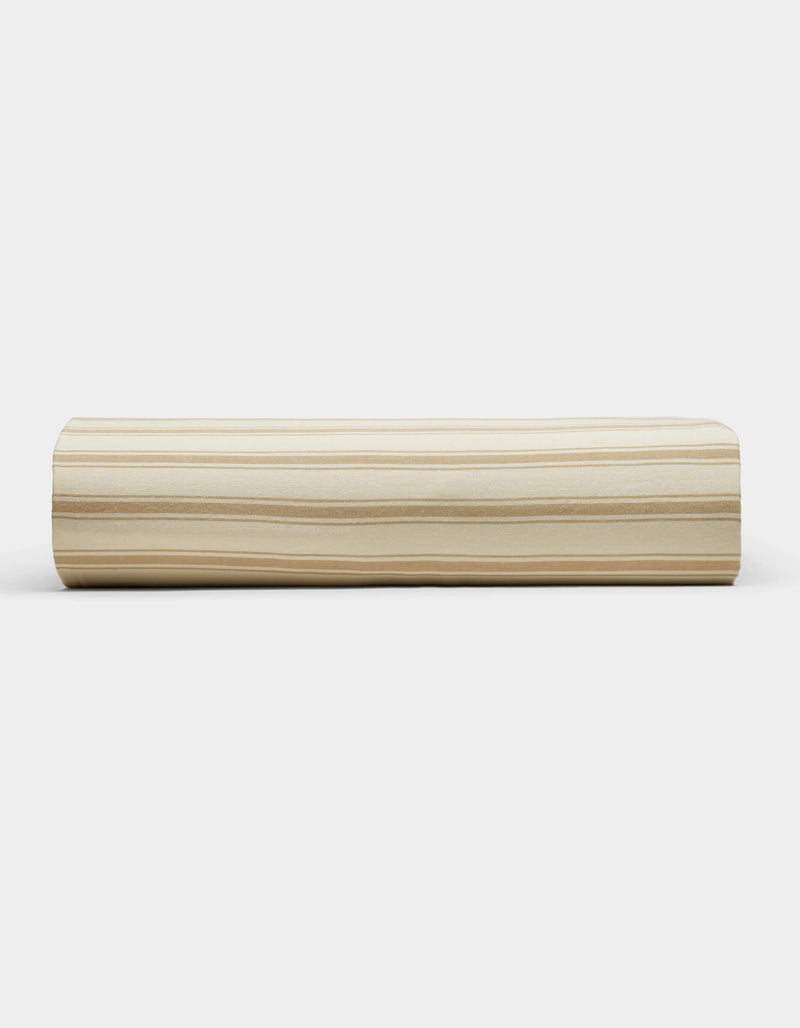 The Cozy Earth Soft-Wash Cotton Sheet Set is shown in a light, neutral palette with subtle horizontal beige and cream stripes, displayed against a plain white background.