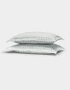 Two Cozy Earth Soft-Wash Cotton Quilted Shams in white with light blue and gray stripes are stacked together against a plain white background.|Color:River and Sea Salt Stripe