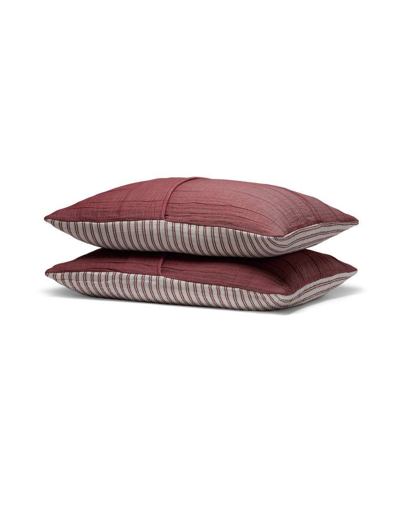 Two Waterfront Shams by Cozy Earth, stacked together, showcase maroon fabric on top with striped sides in gray, white, and maroon tones, all set against a white background.