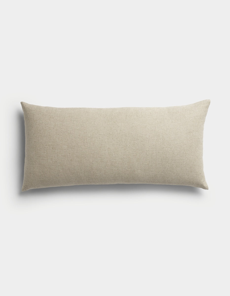 The Sonoma Throw Pillow by Cozy Earth is a rectangular, beige accent pillow featuring a smooth fabric texture, displayed against a plain white background.