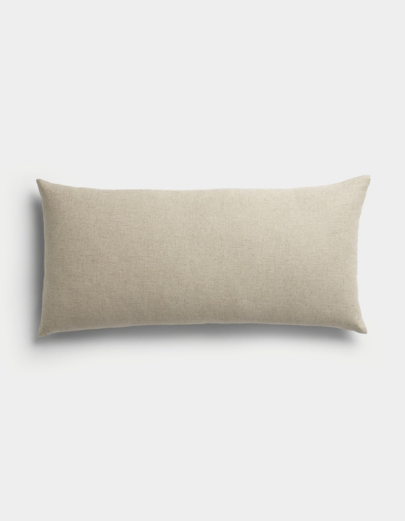 The Sonoma Throw Pillow by Cozy Earth is a rectangular, beige accent pillow featuring a smooth fabric texture, displayed against a plain white background.