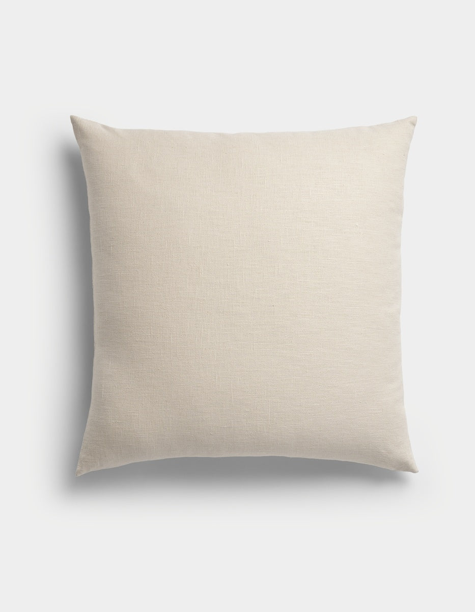 The Cozy Earth Sonoma Throw Pillow, featuring a square shape and beige textured fabric cover, is displayed against a plain white background with a soft shadow on the left side.