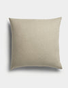 The Sonoma Throw Pillow by Cozy Earth is a square, beige cushion featuring a plain fabric texture, displayed against a white background with a soft shadow to the left.|Color:Tallow|Size:26" x 26"