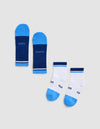 Two pairs of Cozy Earth Essential Quarter Socks are shown: one pair in dark blue with "COZY" and "EARTH" on the soles, and one pair in white with blue toes, heels, cuffs, and "COZY" and "EARTH" on the soles.|Color:Harbor