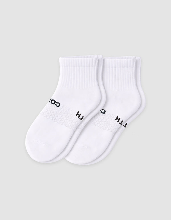 The Cozy Earth Men's Essential Quarter Sock features white ribbed cuffs and a discreet black text design on the sides, displayed against a plain light background.|Color:White