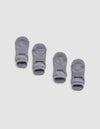 Four small gray Essential Ankle Socks by Cozy Earth are arranged in two pairs on a white background. The left pair has "COZY" and the right pair has "EARTH" printed in black text near the cuff.|Color:Stone