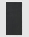 The Cozy Earth Loop Terry Bath Mat is rectangular and solid dark gray with a soft, uniform texture, shown against a plain light background.|Color:Graphite