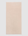 The Cozy Earth Loop Terry Bath Mat, a rectangular bath mat in light beige with a soft, plush texture, is displayed against a plain white background.|Color:Petal