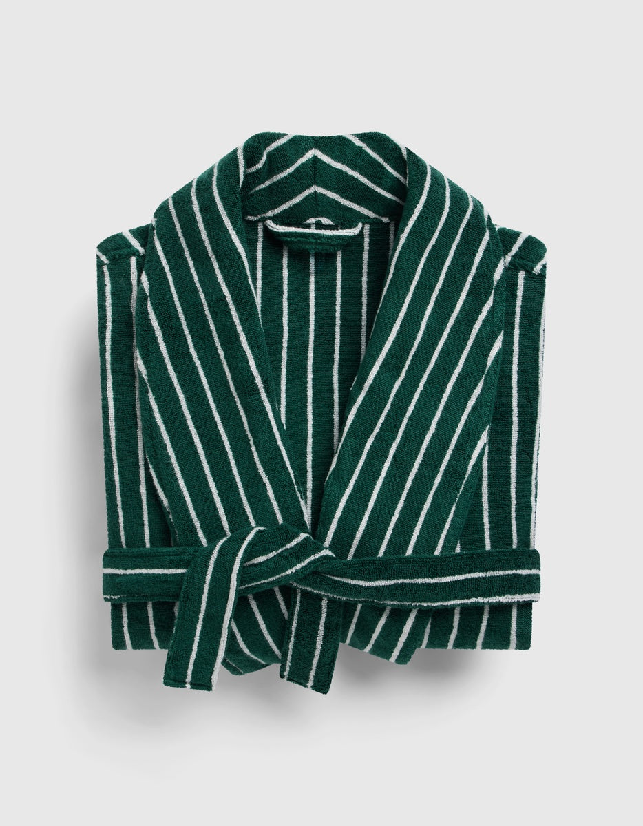 The Luxe Bath Robe by Cozy Earth in dark green with white vertical stripes and a matching belt, displayed on a light gray background.