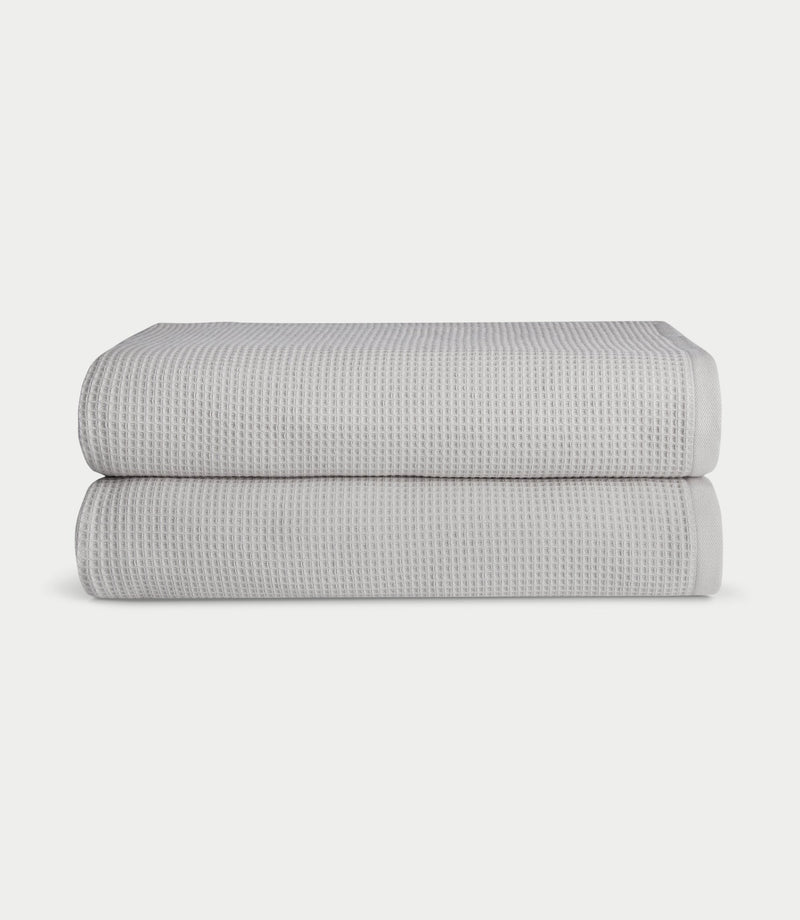 Waffle Bath Sheets in the color Light Grey. Photo of Waffle Bath Sheets taken with white a background.