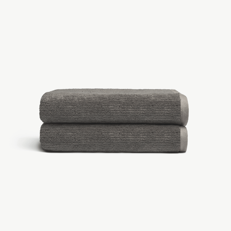 Ribbed Terry Bath Towels in the color Charcoal. Photo of Charcoal Waffle Bath Towels taken with white background.