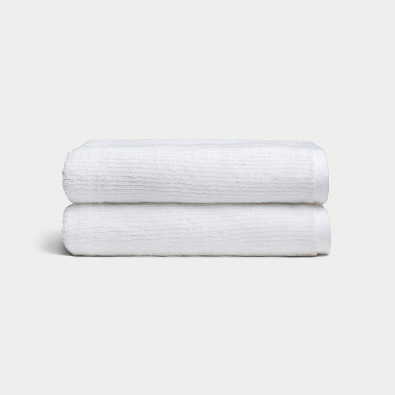 Ribbed Terry Bath Towels in the color White. Photo of White Waffle Bath Towels taken with white background.