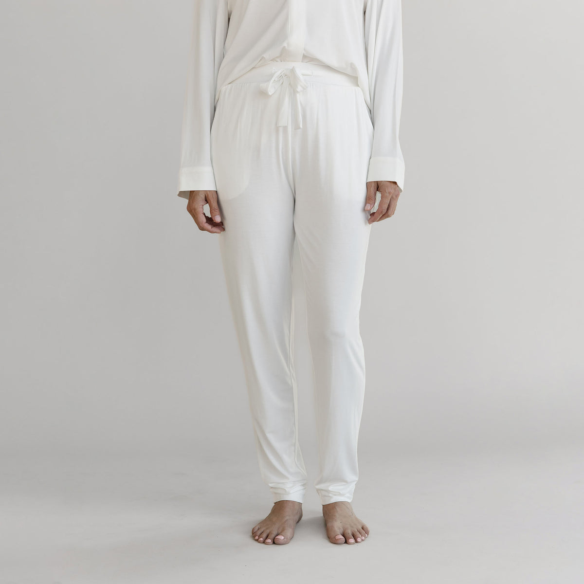 Gray Cozy Earth Stretch Knit Tapered Pant set worn by a person on a light gray background |Color:Ivory