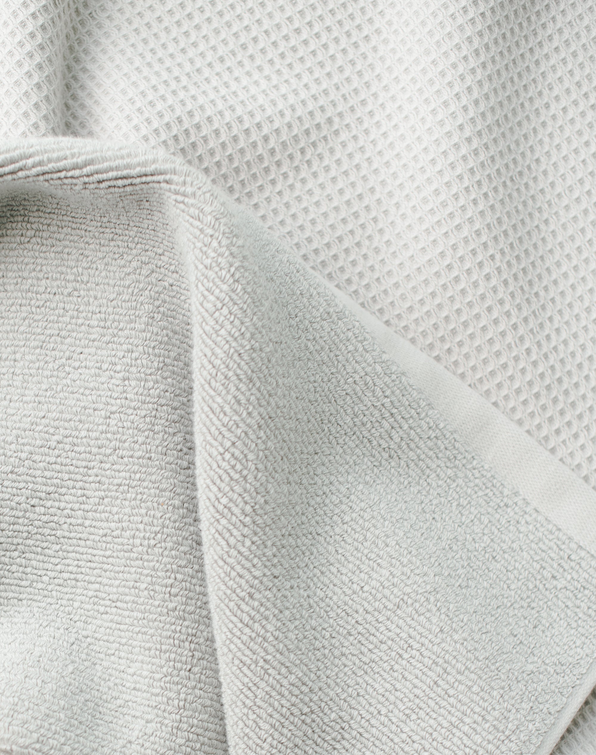 Waffle Bath Towel in the color Harbor Mist. Photo of Harbor Mist Waffle Bath Towel taken as a close up of the Waffle Bath Towel. The picture shows only the towel 