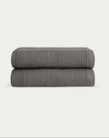 Charcoal Waffle Hand Towel set neatly folded. The photo was taken with a white background. |Color:Charcoal