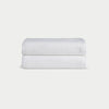 White Waffle Hand Towel set neatly folded. The photo was taken with a white background. |Color:White
