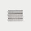 Light Grey Waffle Wash Cloths neatly folded. The photo was taken with a white background. |Color:Light Grey